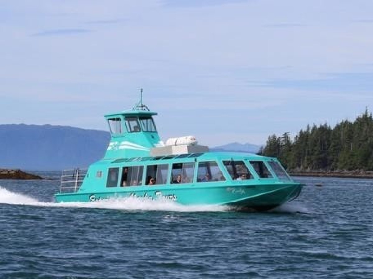 a small boat in a large body of water