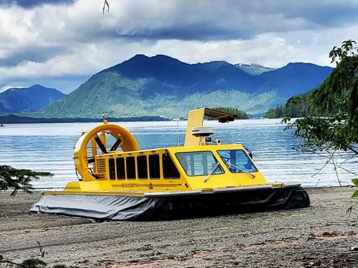 a boat sitting on top of a mountain