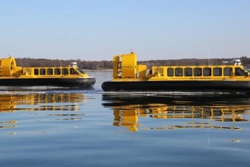 a boat traveling across a large body of water