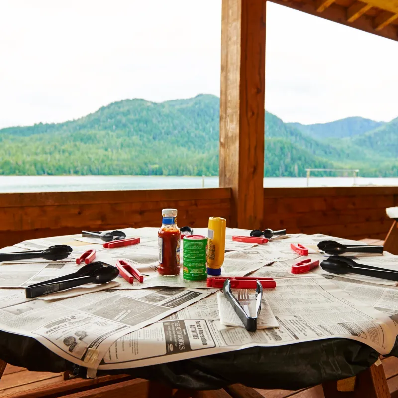 a picnic table sitting next to a window
